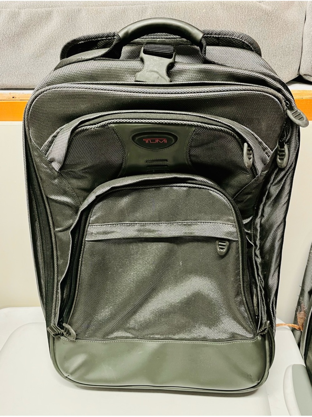 TUMI Olive Green Travel Backpack - Durable Carry-On Bag